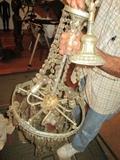 ANTIQUE & VERY HEAVY TALL CRYSTAL CHANDELIER.  PRISMS AND CHANDELIER NEED CLEANING.