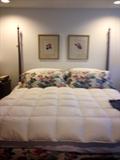 Custom Bedding was made to match the easy chair and ottoman for this 4 poster Baker King Size Bed