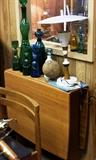 mid century modern drop leaf table, figural bottles