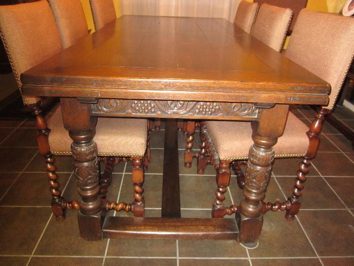 Antique Dining Room Set by the Kensington Manufacturing Co. Large table with 2 fold out leaves, 8 chairs, china cabinet and server. Custm table pad as well.