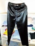 black satin pants a few rough threads at the waist typical for satin.