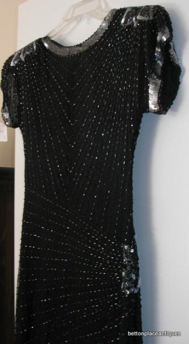 this is a closer view of the longer sequined dress with gray....VERY nice size small elegant indeed