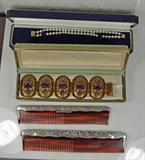 Sterling combs, pearl and gold bracelet