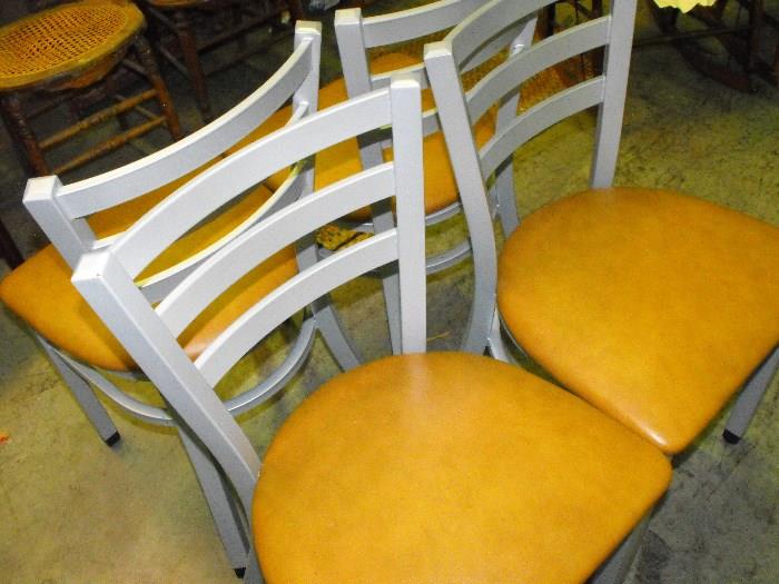set of eight brand new metal chairs