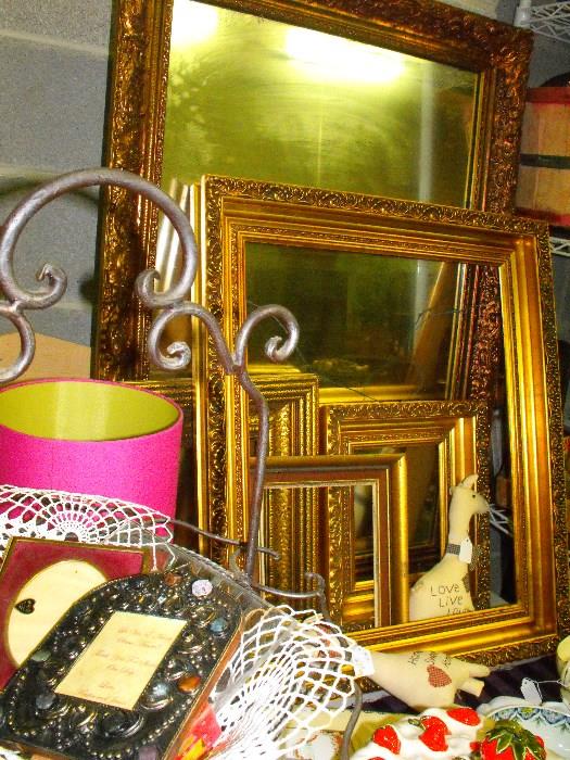 beautiful gilded mirror and frames