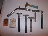 collection of vintage razors and lighters