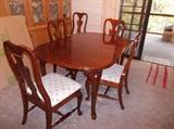 Dining table with 2 leaves and 6 chairs