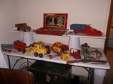 Table of antique metal toys