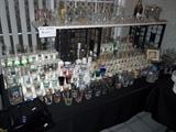 Approx. 250 shot glasses from around the world and local.