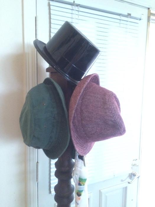Hats and a hat stand