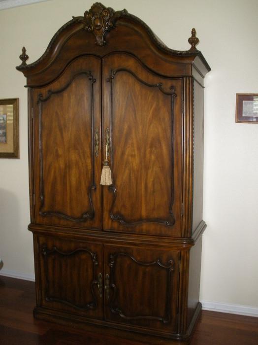 Large wardrobe (top & bottom separate) could also hold sizable wide screen TV,,, 51x24x93h