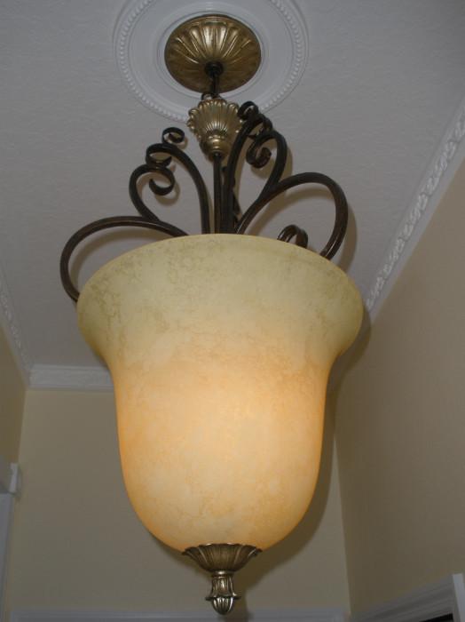 We have two of these art-glass hanging lamps for sale.