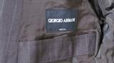 GIORGIO ARMANI SUIT and just one of the many on a complete rack full of GIORGIO ARMANI ITEMS.