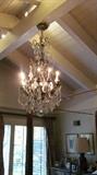 AWESOME CHANDLELIER! Very substantial with large crystals and romantic lighting.
