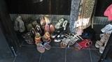 Several pairs of womens shoes, sandals and boots.