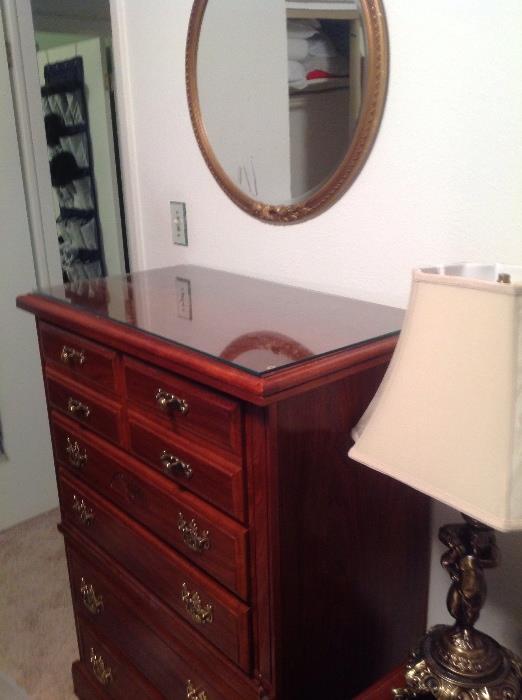 Chest of drawers, traditional style, brass rimmed mirror