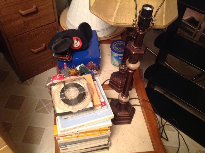 Old reel tapes, Mickey Mouse ears, pair of lamps 