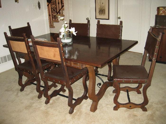 Beautiful Leather, iron and wood dining set from Spain with 6 chairs and buffet.