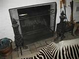 Cast Fire andirons. one of five pair made for employees at gas company. 1920's