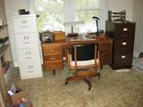 office desk and file cabinets