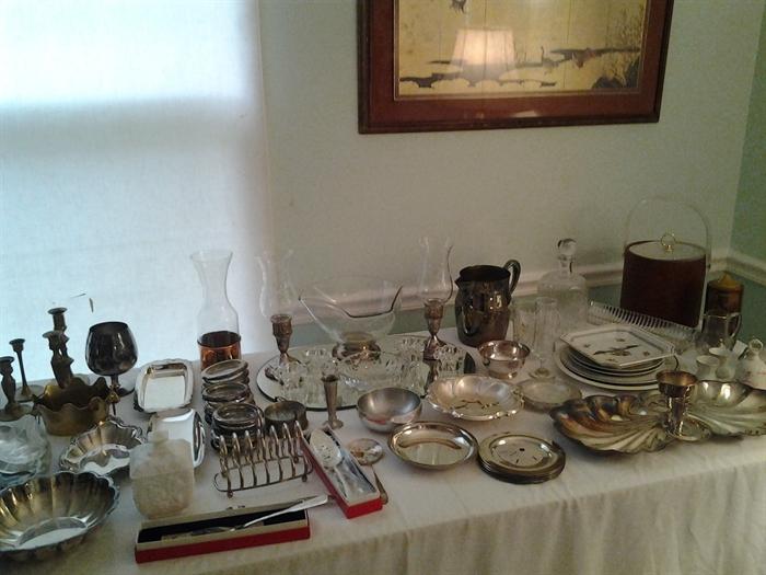 Silverplate assorted small bowls, pitcher, cake servers, brass candlesticks