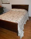 Vintage mahogany bedroom set includes full bed, vanity with mirror and bench, nightstand and tall chest.