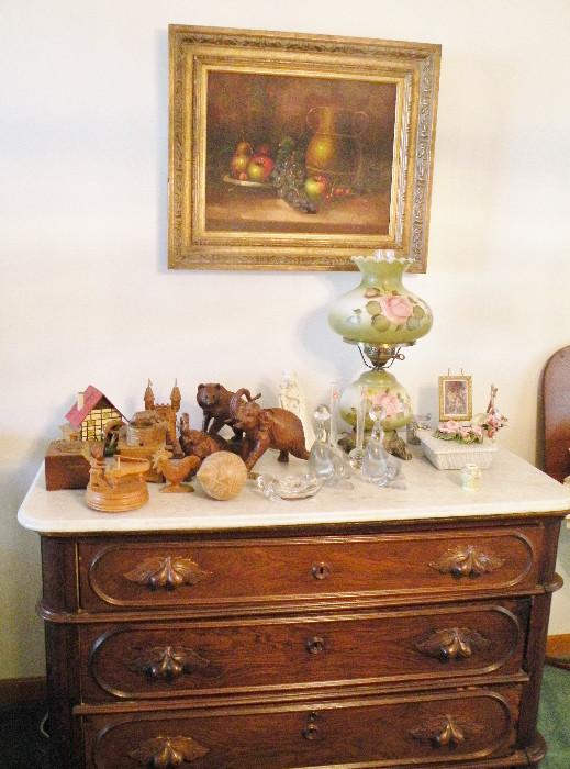 Antique marble top dresser, music boxes, Red Mill sculptures