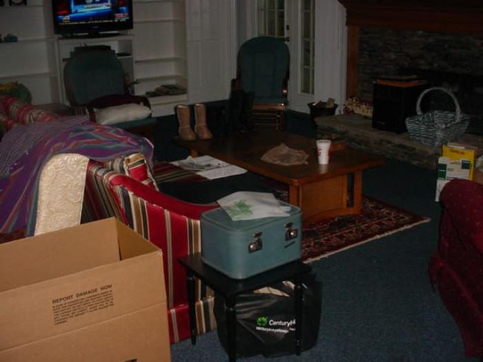 Sorry, for the clutter, but was taken after much of the packing was done....beautiful Living Room furnishings, sofas, chairs, loungers, coffee table, etc. and area rugs