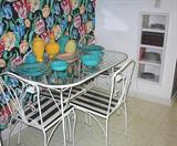 Wrought iron and glass top table and 4 chairs, Fiesta, etc.
