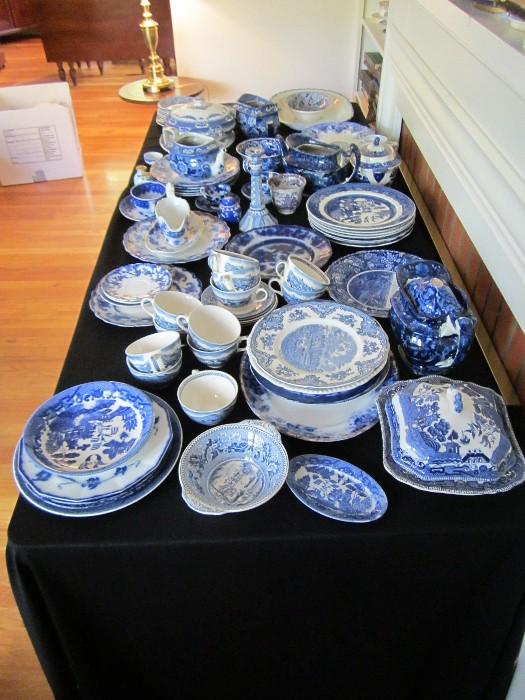 Table of antique blue & white china and flow blue.