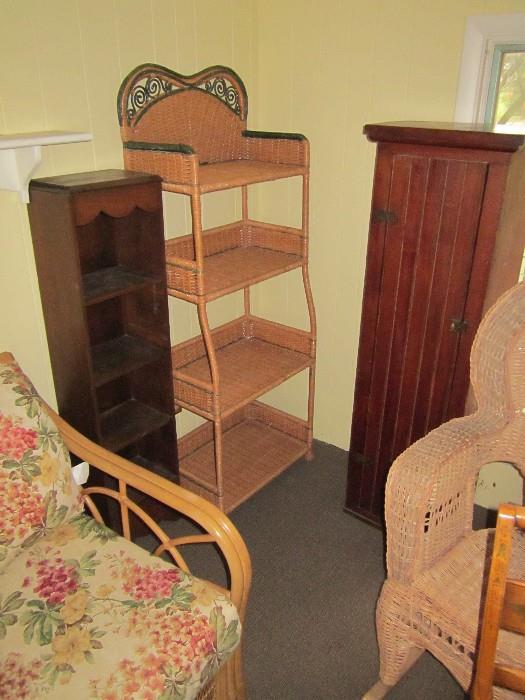 narrow cupboards and wicker bookcase stand.