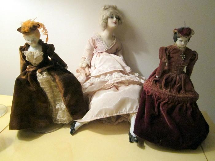 Three of the many many dolls.
