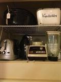       Some of the many small kitchen appliances;