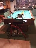            Exercise bike; pool table; hand tools;