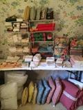         Large selection of pillows, napkins, bedding