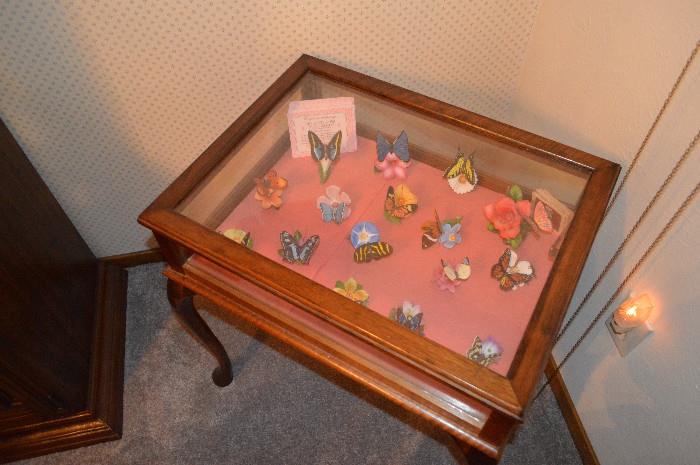 Franklin Mint Butterflies in glass curio display table