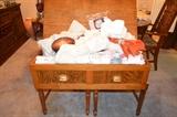 Table linens in wood chest
