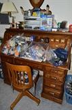 roll top desk and wooden office chair