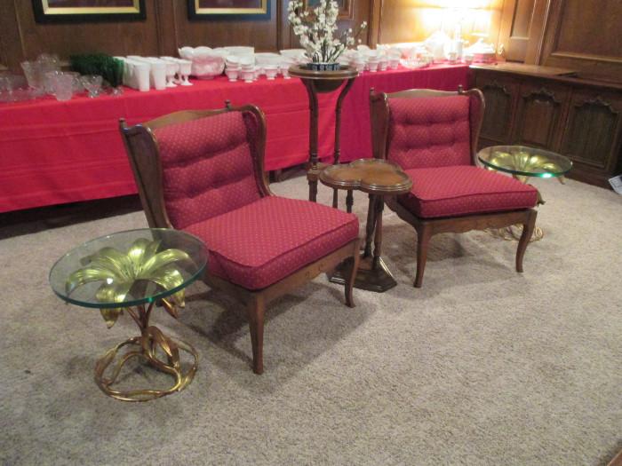 Two club 'wing back' style chairs, two Italian Gilt metal end tables with round glass tops.