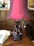               Vintage telephone and monkey lamp