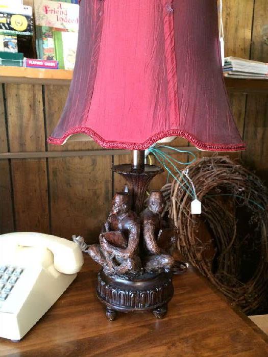               Vintage telephone and monkey lamp