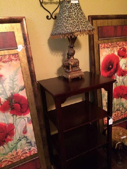                     Small 3-shelf table; elephant lamp