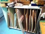 Mattings, filled file cabinet