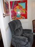 Assorted signed art by various known artist. New recliner with electric lift.
