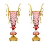 LOT 10: A PAIR OF FRENCH EMPIRE STYLE CUT GLASS AND GILT METAL MOUNTED URNS