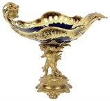 LOT 17: A KPM STYLE PORCELAIN CENTERPIECE WITH FIGURAL GILT BRONZE MOUNT