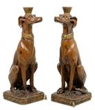 LOT 39: A PAIR OF VICTORIAN CARVED AND PARCEL GILT GREYHOUNDS