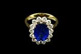LOT 94: A SAPPHIRE AND DIAMOND PRINCESS DIANA STYLE RING
