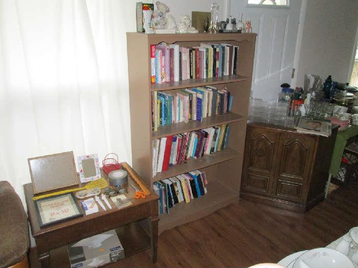 bookcase, books and household