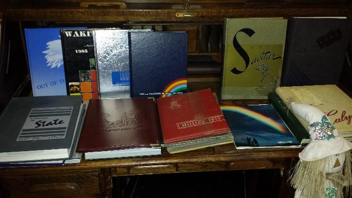 Variety of old St. Joseph yearbooks, along with MU and K State yearbooks